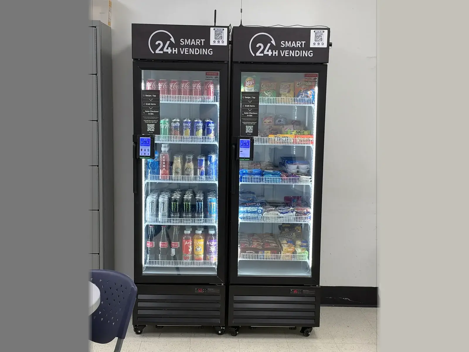 Two drink coolers in a school hallway