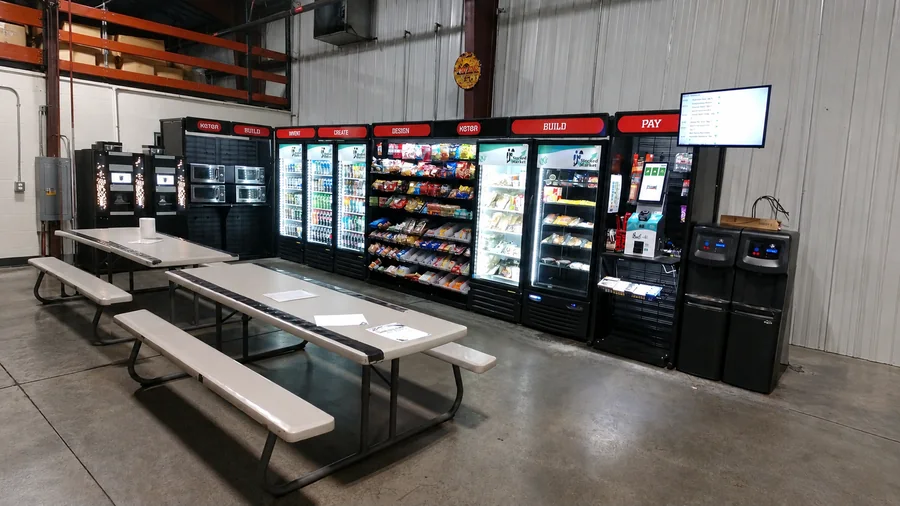 Warehouse micro market with coolers, snack racks and microwaves