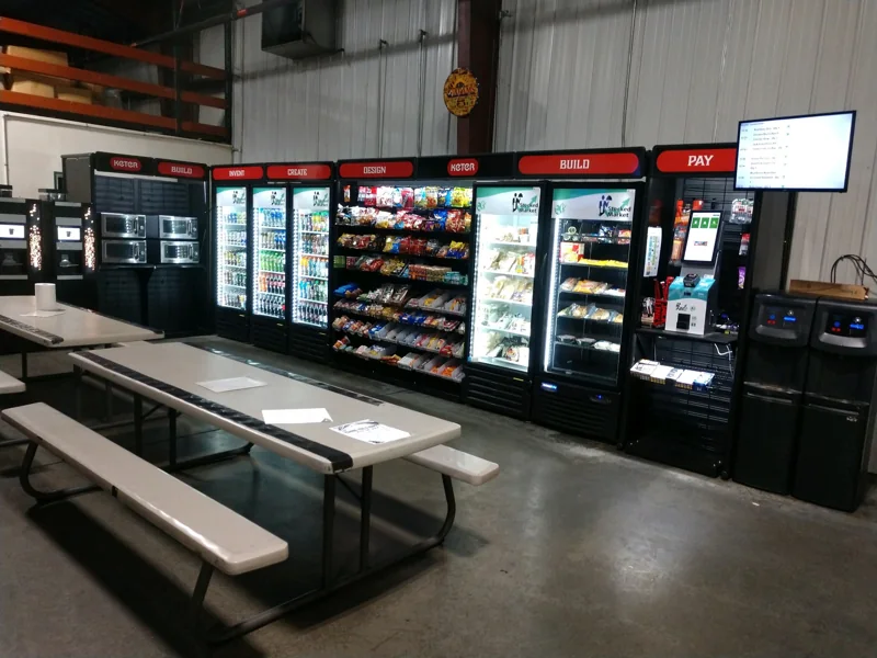Distribution center breakroom with coolers and tables